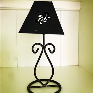 Antiqued metal candle holder